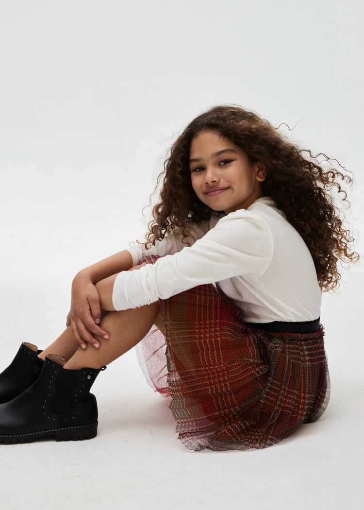 red plaid skirt